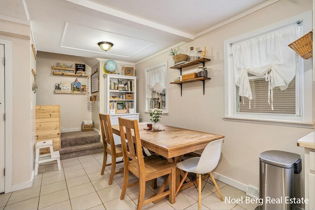 1314 Grant St, Grand Haven, MI 49417 - dining room featuring light tile patterned floors and baseboards