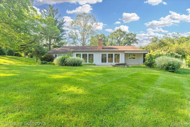 1656 Keller Ln, Bloomfield Hills, MI 48302 - back of house with a yard and a chimney