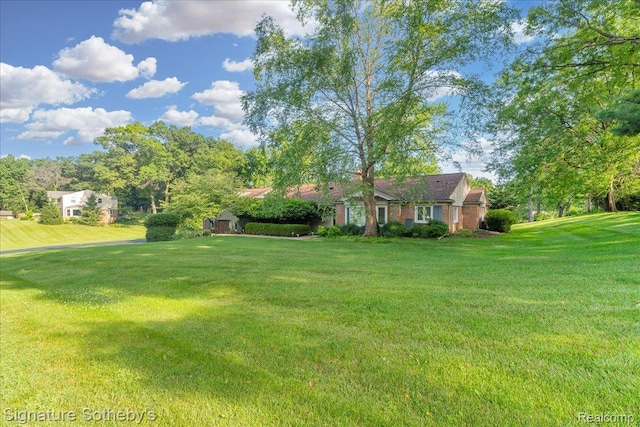 1656 Keller Ln, Bloomfield Hills, MI 48302 - view of grassy yard with a storage unit
