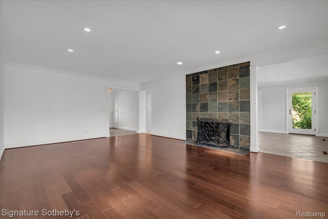 1656 Keller Ln, Bloomfield Hills, MI 48302 - unfurnished living room with ornamental molding, wood finished floors, a tile fireplace, and recessed lighting