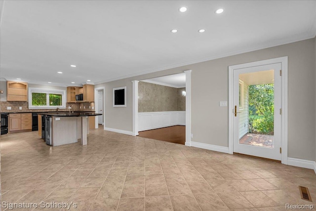 1656 Keller Ln, Bloomfield Hills, MI 48302 - kitchen with dark countertops, ornamental molding, recessed lighting, stove, and backsplash