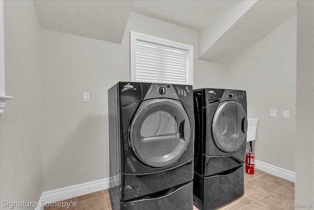 1656 Keller Ln, Bloomfield Hills, MI 48302 - washroom with washer and dryer and tile patterned floors