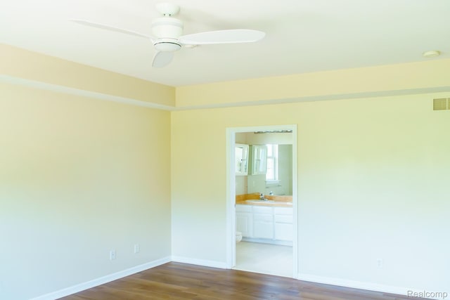 1803 Pinecroft Dr, Canton, MI 48188 - unfurnished room featuring wood finished floors, a ceiling fan, and a smoke detector