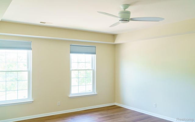 1803 Pinecroft Dr, Canton, MI 48188 - empty room with wood finished floors and a ceiling fan