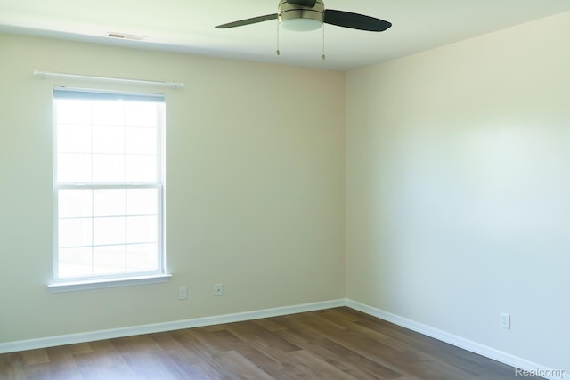 1803 Pinecroft Dr, Canton, MI 48188 - unfurnished room featuring dark wood-type flooring and ceiling fan