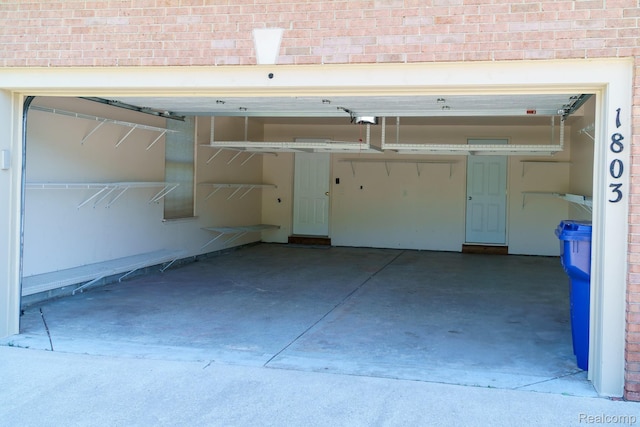 1803 Pinecroft Dr, Canton, MI 48188 - garage with a garage door opener