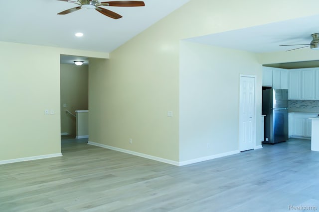 1803 Pinecroft Dr, Canton, MI 48188 - unfurnished room with ceiling fan, light wood-style flooring, and lofted ceiling