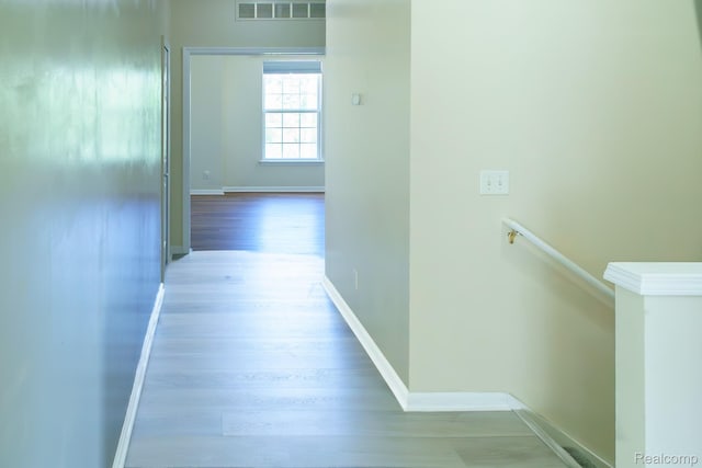 1803 Pinecroft Dr, Canton, MI 48188 - hall with wood finished floors and an upstairs landing