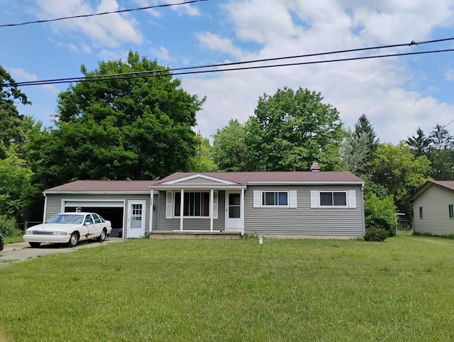 6363 Bluejay Dr, Flint, MI 48506 - single story home with an attached garage, a front lawn, and driveway