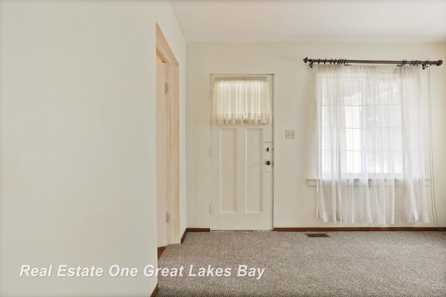 2249 N Clinton St, Saginaw, MI 48602 - carpeted entrance foyer featuring plenty of natural light