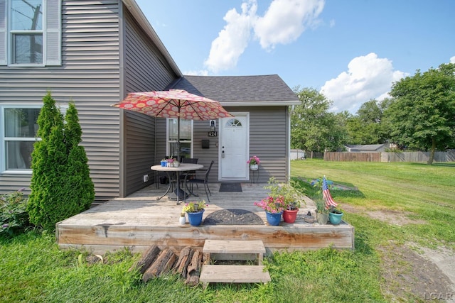 424 W Summit St, Adrian, MI 49221 - rear view of property featuring a deck and a shingled roof
