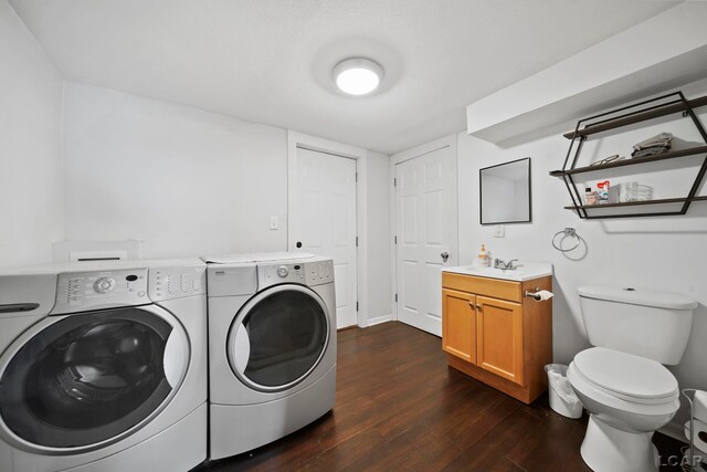 424 W Summit St, Adrian, MI 49221 - laundry area featuring washer and clothes dryer and dark wood finished floors