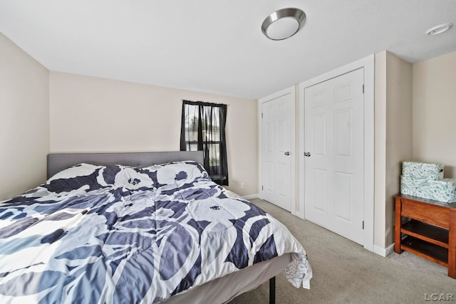 424 W Summit St, Adrian, MI 49221 - bedroom with carpet floors and baseboards