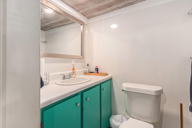 52 S Emerson Lake Dr, Branch, MI 49402 - bathroom with vanity and toilet