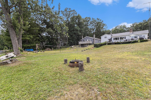 52 S Emerson Lake Dr, Branch, MI 49402 - view of grassy yard with view of wooded area