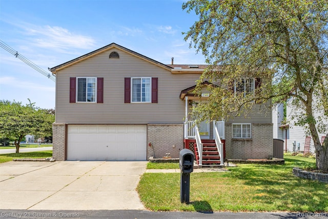 1786 Daisy Ln, Westland, MI 48186 - view of front of home with brick siding, an attached garage, concrete driveway, and a front lawn