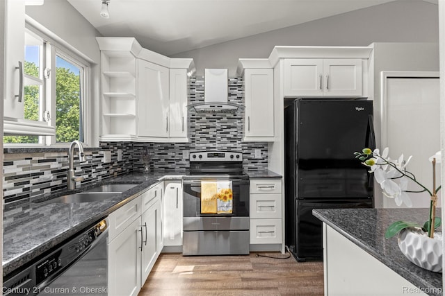 1786 Daisy Ln, Westland, MI 48186 - kitchen featuring freestanding refrigerator, stainless steel range with electric cooktop, dishwashing machine, wall chimney exhaust hood, and white cabinetry