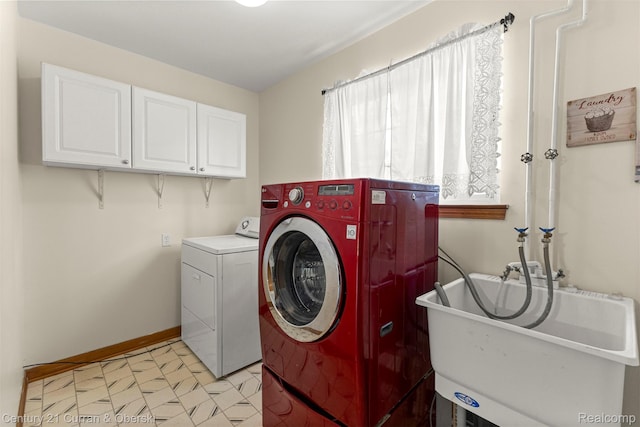 1786 Daisy Ln, Westland, MI 48186 - laundry room featuring cabinet space and separate washer and dryer