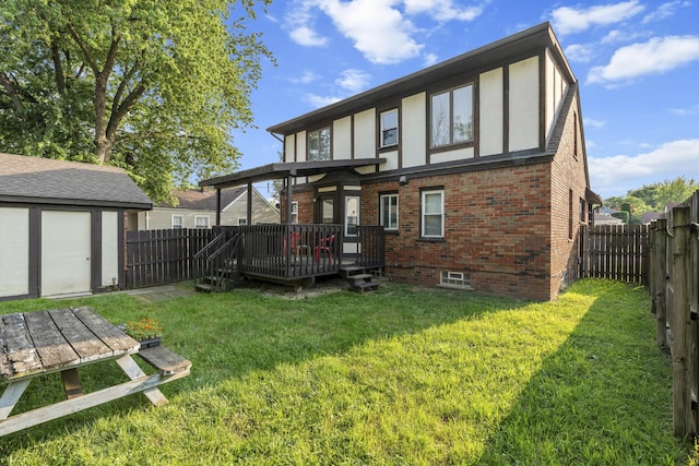 22358 Firwood Ave, Eastpointe, MI 48021 - rear view of property featuring a deck, brick siding, a fenced backyard, stucco siding, and a shed