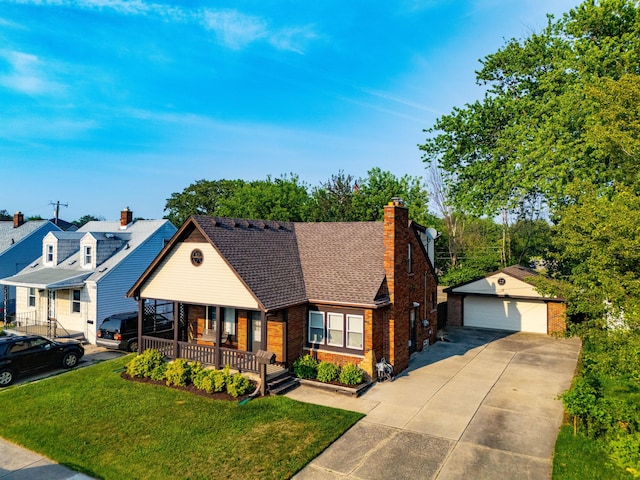 22358 Firwood Ave, Eastpointe, MI 48021 - view of front of home with a porch, an outdoor structure, a garage, brick siding, and a front lawn