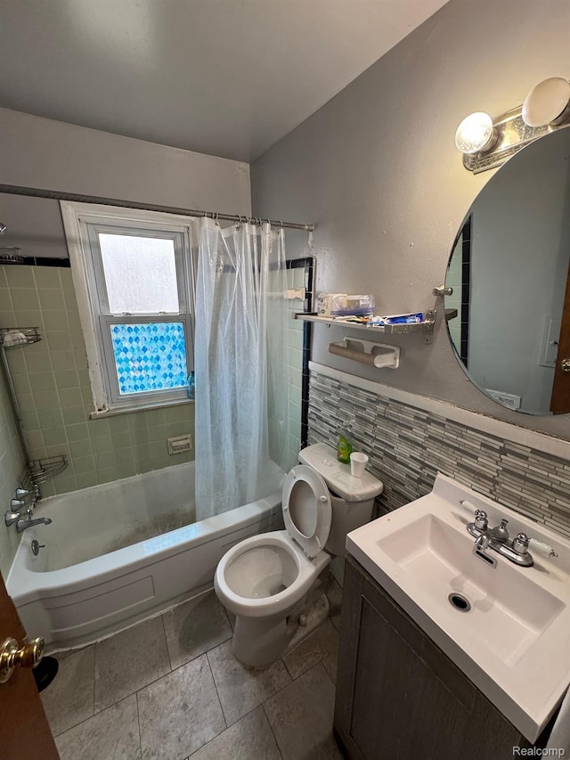 8116 Wyoming St, Detroit, MI 48204 - bathroom with vanity, shower / tub combo, tile patterned floors, tile walls, and tasteful backsplash