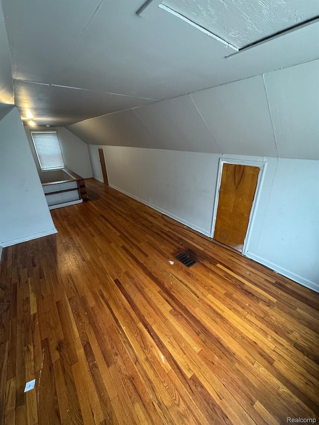 8116 Wyoming St, Detroit, MI 48204 - bonus room with hardwood / wood-style floors and vaulted ceiling