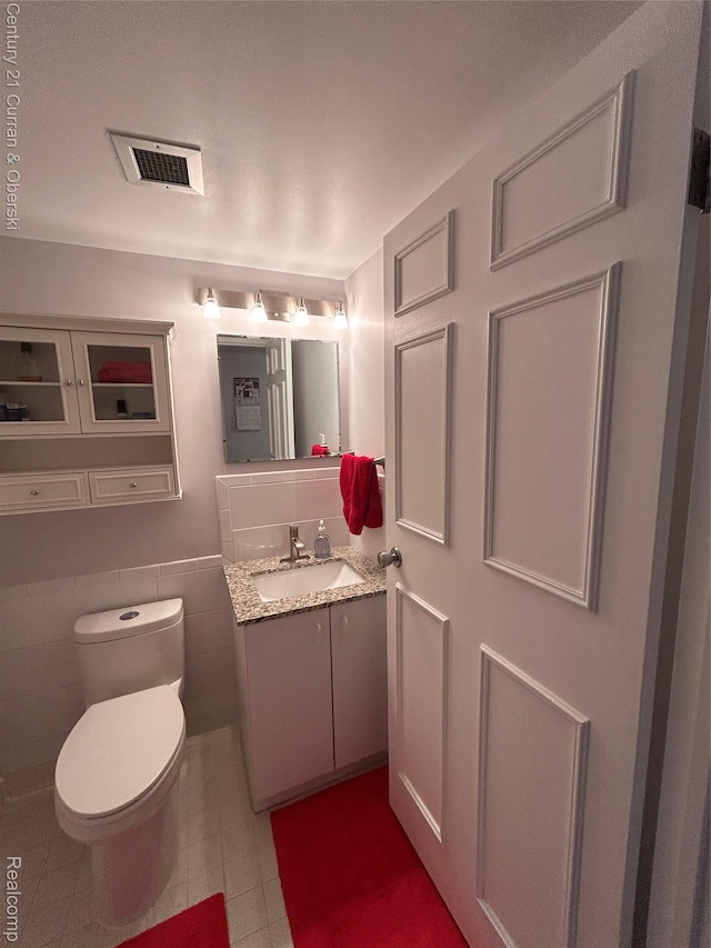 21800 Morley Ave Unit 607, Dearborn, MI 48124 - half bathroom featuring vanity and toilet