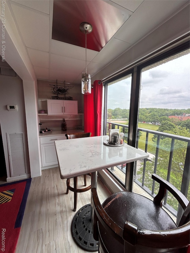 21800 Morley Ave Unit 607, Dearborn, MI 48124 - dining space featuring light wood-style flooring