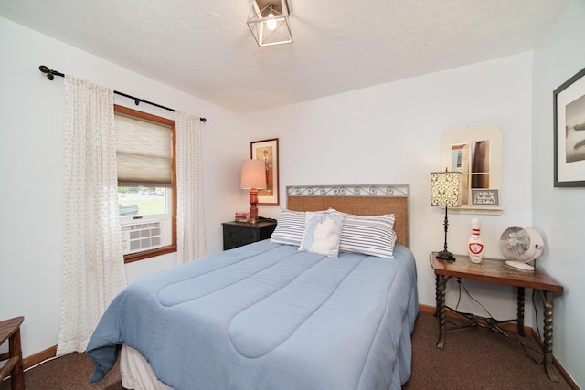 5015 Main St, Onekama, MI 49675 - bedroom with carpet and baseboards