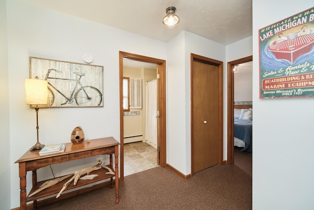 5015 Main St, Onekama, MI 49675 - hall with baseboard heating and carpet