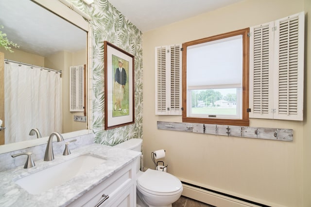 5015 Main St, Onekama, MI 49675 - bathroom with a baseboard heating unit, vanity, and wallpapered walls