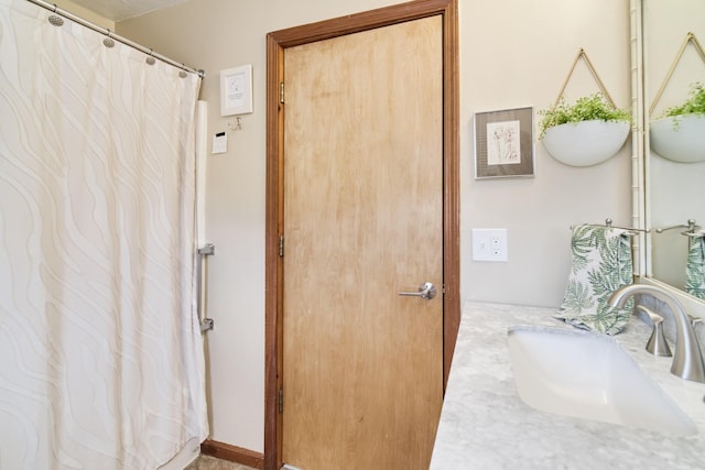 5015 Main St, Onekama, MI 49675 - bathroom featuring vanity and a shower with curtain