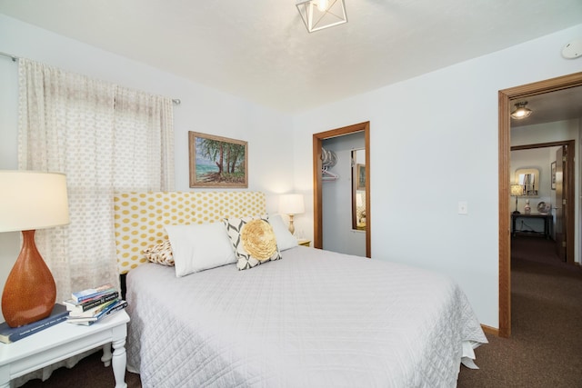 5015 Main St, Onekama, MI 49675 - carpeted bedroom featuring a spacious closet