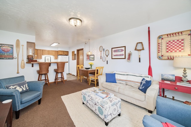 5015 Main St, Onekama, MI 49675 - living area featuring dark colored carpet