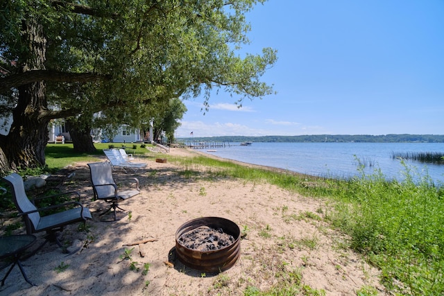 5015 Main St, Onekama, MI 49675 - water view featuring an outdoor fire pit