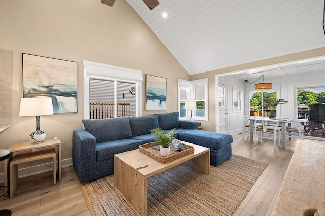 31326 Curran Beach Rd, Dowagiac, MI 49047 - living room with high vaulted ceiling, light wood-style flooring, ceiling fan, and recessed lighting