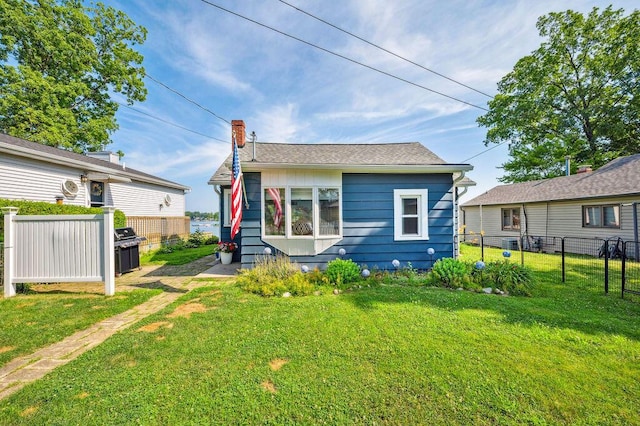 31326 Curran Beach Rd, Dowagiac, MI 49047 - rear view of house with a chimney