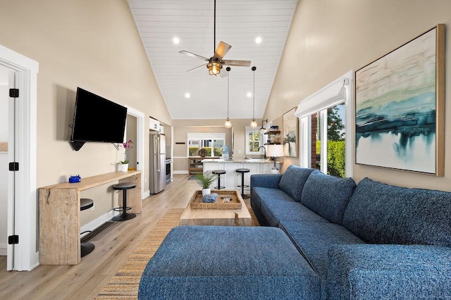 31326 Curran Beach Rd, Dowagiac, MI 49047 - living room with high vaulted ceiling, light wood-style floors, ceiling fan, recessed lighting, and wood ceiling