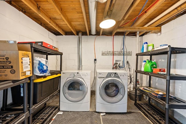 31326 Curran Beach Rd, Dowagiac, MI 49047 - washroom featuring washer and clothes dryer and concrete block wall