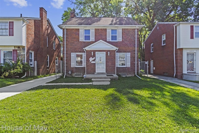 16842 Greenview Ave, Detroit, MI 48219 - view of property featuring a front lawn and brick siding
