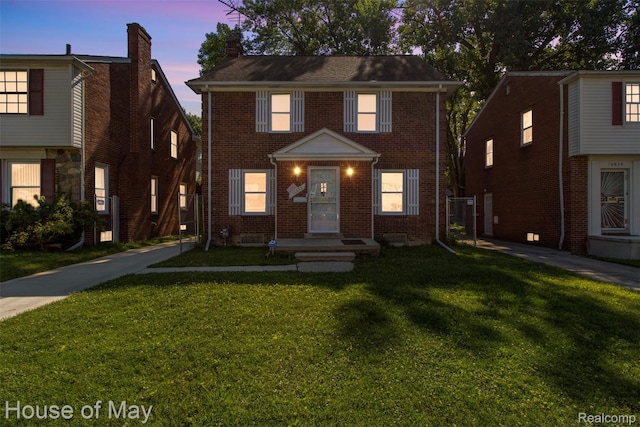16842 Greenview Ave, Detroit, MI 48219 - view of property with a front lawn and brick siding