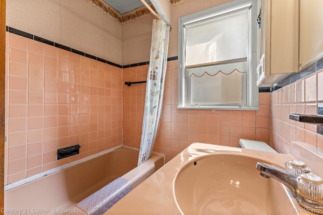 19163 Henry St, Melvindale, MI 48122 - full bathroom featuring a sink and shower / bath combo with shower curtain