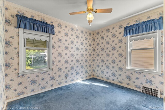 19163 Henry St, Melvindale, MI 48122 - carpeted spare room featuring a ceiling fan and ornamental molding