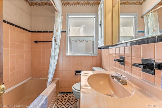 19163 Henry St, Melvindale, MI 48122 - bathroom with tile walls, shower / bath combo with shower curtain, and vanity