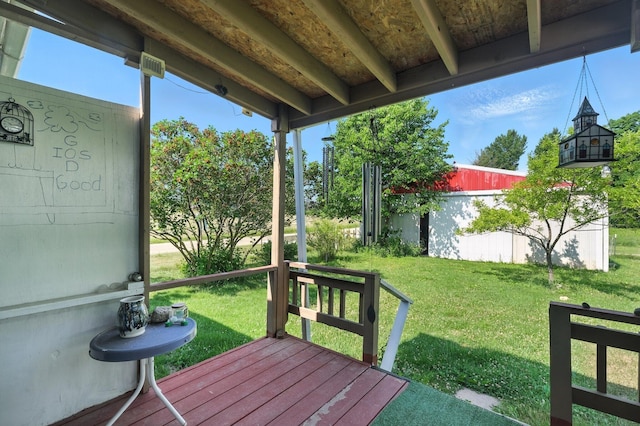 8698 Big Stone Lake Rd, Evart, MI 49631 - wooden terrace featuring a lawn