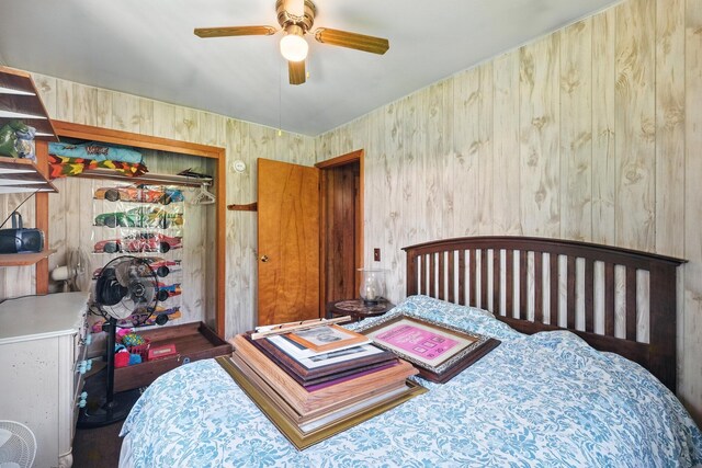 8698 Big Stone Lake Rd, Evart, MI 49631 - bedroom with a closet and ceiling fan