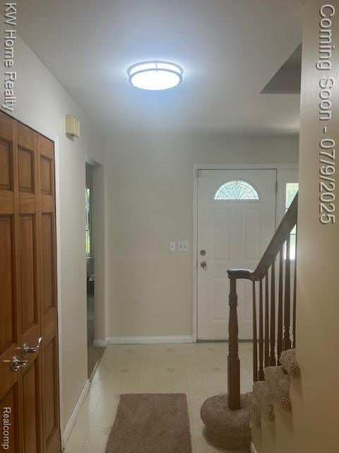 24890 Arden Park Dr, Farmington Hills, MI 48336 - foyer featuring baseboards and stairway