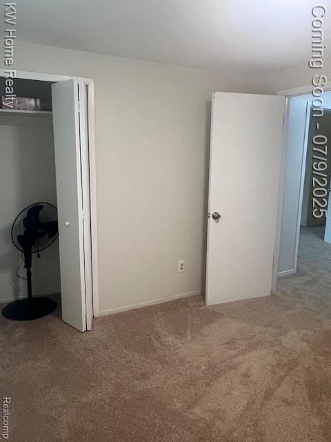 24890 Arden Park Dr, Farmington Hills, MI 48336 - unfurnished bedroom with carpet flooring and a closet