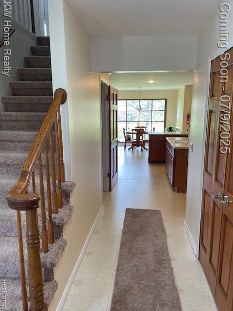 24890 Arden Park Dr, Farmington Hills, MI 48336 - corridor with stairs and baseboards