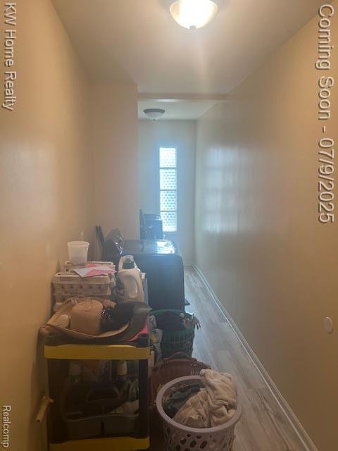 24890 Arden Park Dr, Farmington Hills, MI 48336 - corridor with wood finished floors and baseboards